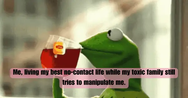 a green frog puppet drinking a red beverage